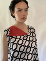 Orange Trigon collar top